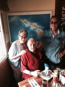 CENTRAL CASTING--Jackie Joseph and husband David Lawrence visit with Dick Linke at his favorite Hawaii hangout. Dick's cast is from a recent tumble at his home. Photo by Bettina Linke.