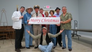 Maggie Peterson (center) and Rodney Dillard (far right) share holiday greetings with help from fans Tom and Shirley Ditt (either side of Maggie) and tribute artists Allan "Floyd" Newsome, Bob "Briscoe" Mundy, David "Mayberry Deputy" Browning, Jeff "Howard" Branch and Phil "Ernest T." Fox.