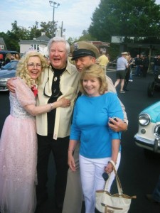 James Best enjoys a group hug with Mayberry Days Pork Queen Patty Browning, Mayberry Deputy David Browning and Best wife Dorothy.