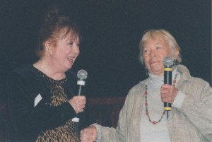 FUN TV COUSINS--Betty Lynn and Mary Grace enjoy a moment on stage together at Judge Joel Laird's Mayberry Cast Reunion event in Pelham, Ala., in October 2000.