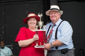 RED AHEAD--Mayberry Days Trivia Contest Proctor Kenneth Junkin presents the 2014 trophy to Pat Bullins (again!)  Photo by Hobart Jones.