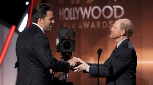 HAPPY HAND-OFF–Ron Howard presents Ben Affleck the Hollywood Film Award for “Gone Girl” at November's Hollywood Film Awards…in Hollywood.