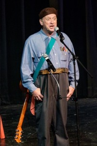 YO!--George Lindsey Jr. on stage at Colonel Tim's Talent Time. He's seen here wearing some of his his father's Goober wardrobe. Photo by Hobart Jones.