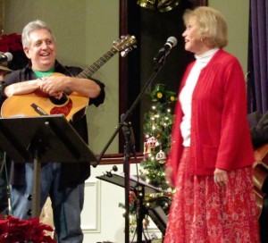 JOLLY TIME--Rodney Dillard and Maggie Peterson onstage with their "Mayberry Christmas" show in Mt. Juliet, Tenn., in December.