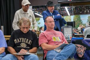 Mayberry Days 2024 Trivia Champion Mike Jones (right) and runner-up Jim Sherrill (left) concentrate to get the answer.
