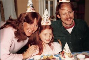 Cheryl, Bryce Dallas, and Ron at Bryce's birthday in 1980s.