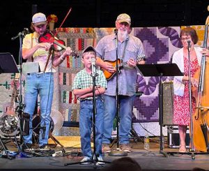 Macon, Mo. - Opie sang Old Dan Tucker and stole the show.