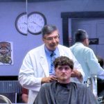 Floyd cutting Coy's hair in Mayberry Man season 2