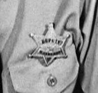 Screen capture of Barney's badge